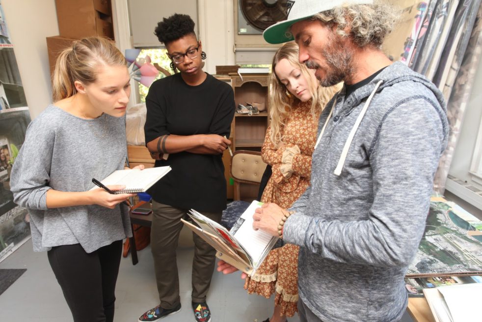 Students from UPenn's History of Art and Fine Arts programs in an artist's studio.