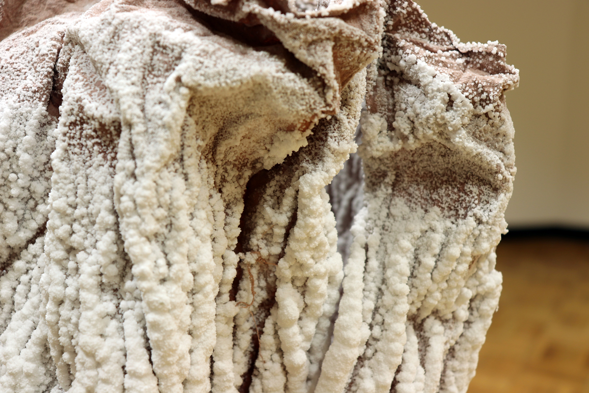 Salt crystalized on a piece of fabric.
